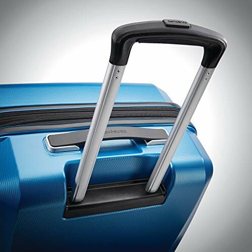 Close-up of a blue suitcase handle.