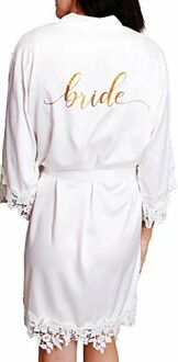 White bridal robe with lace trim and 'bride' text on back.