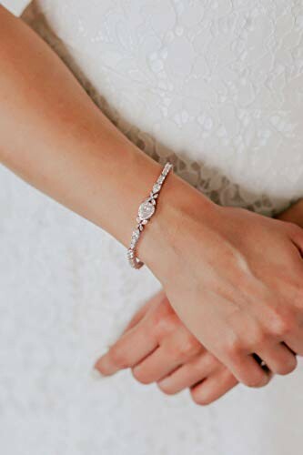 Close-up of a woman's wrist wearing an elegant bracelet.