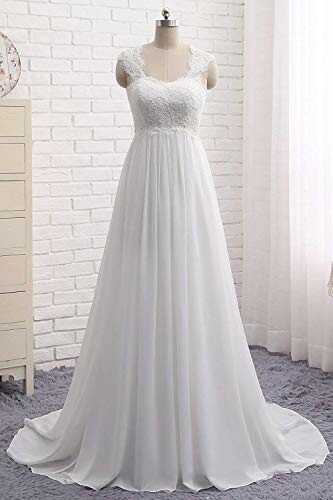 Elegant white wedding dress with lace bodice and flowing skirt.