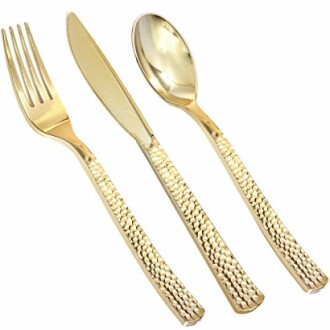 Gold fork, knife, and spoon with textured handles