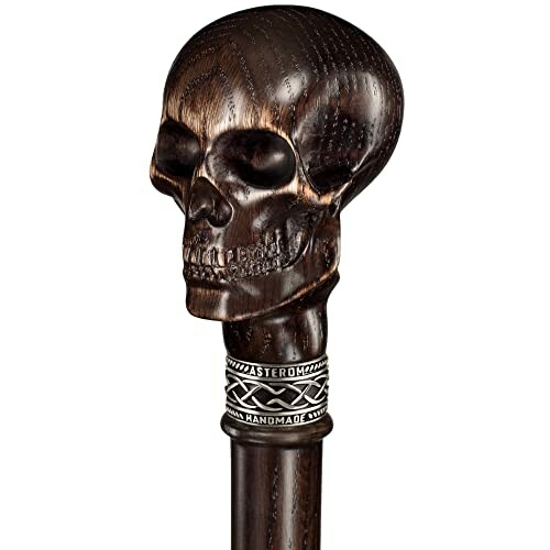 Walking cane with a carved wooden skull handle