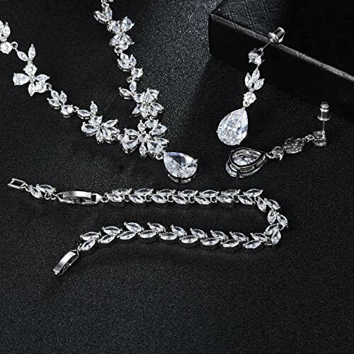 Elegant diamond jewelry set with necklace and bracelet.