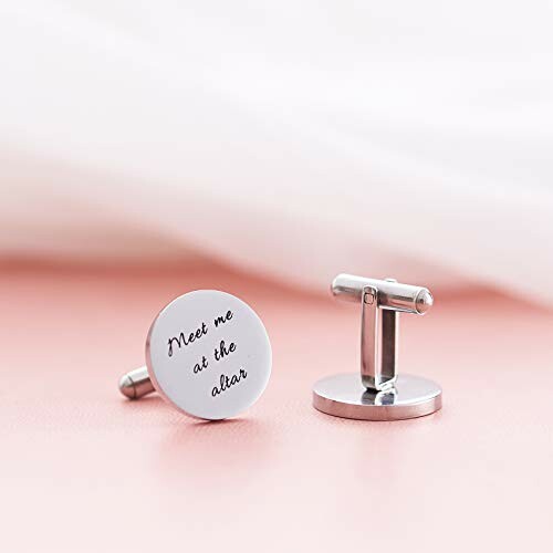 Round silver cufflinks with 'Meet me at the altar' inscription.