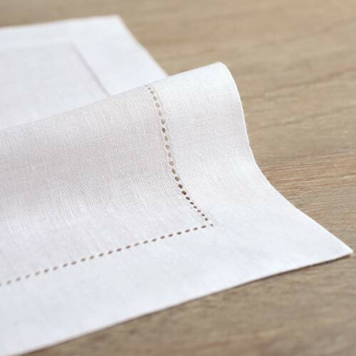 White hemstitch napkin on wooden table