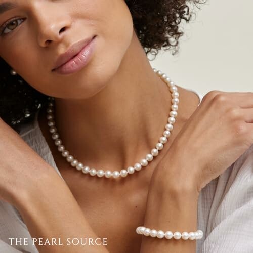 Woman wearing a pearl necklace and bracelet