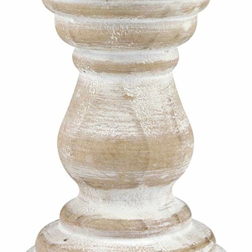 Close-up of a wooden candlestick holder with a rustic finish.